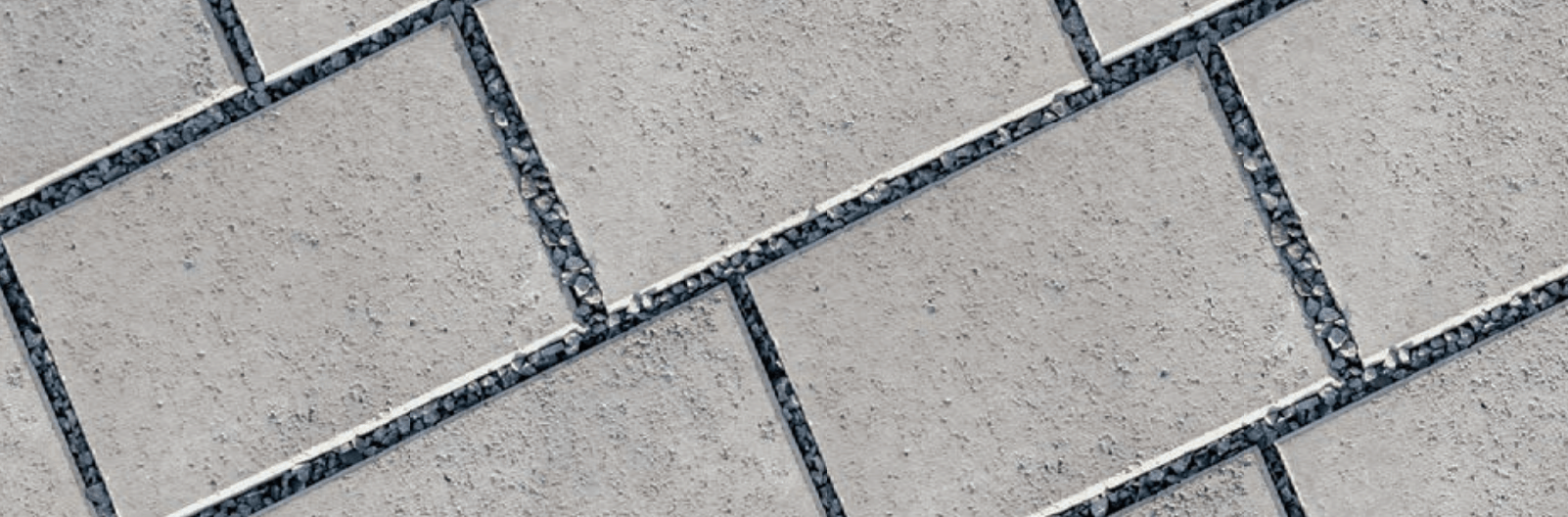 Detailed view of polymeric sand joints between pavers