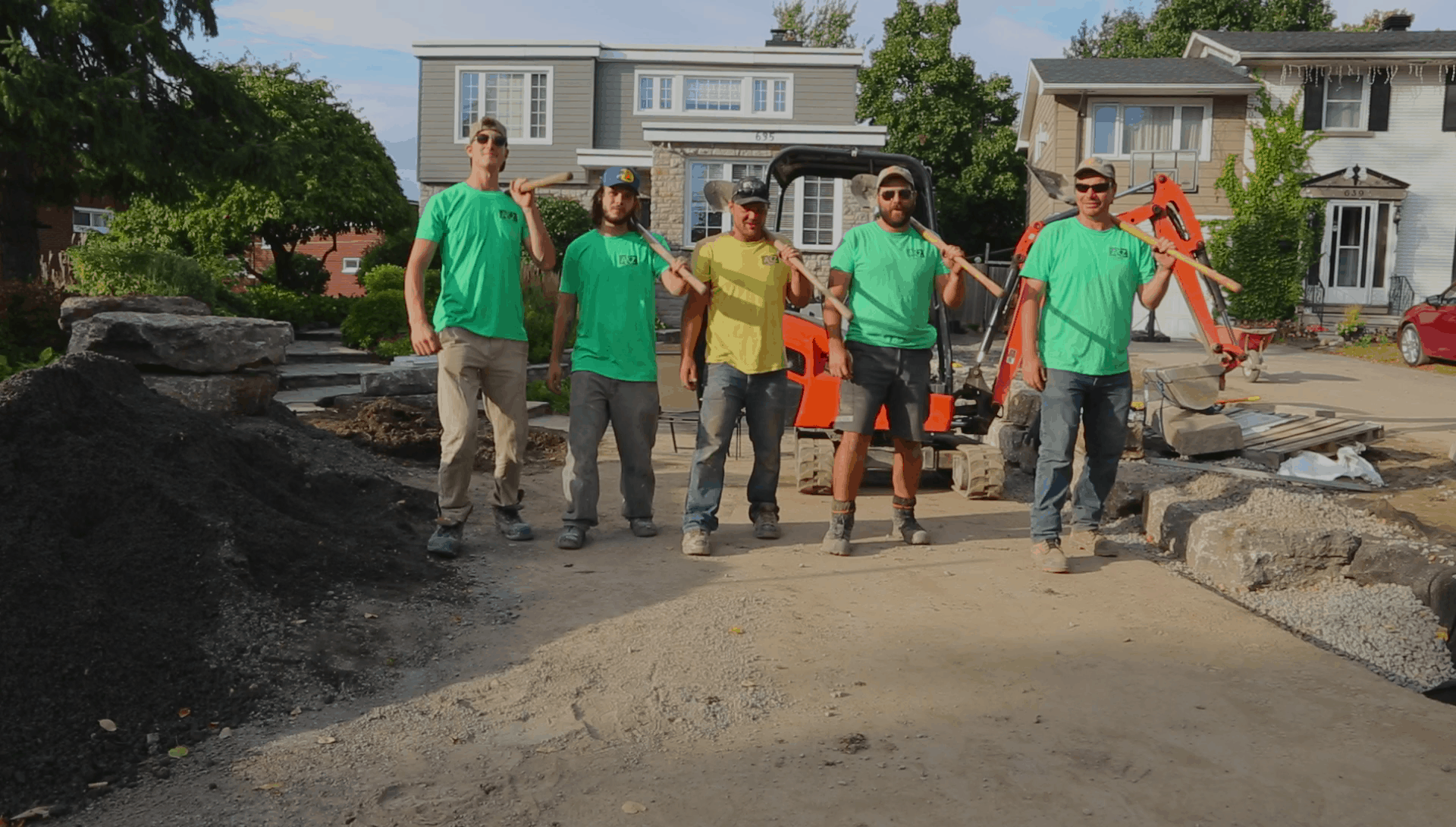 Interlock pavers being lifted to access the foundation beneath them